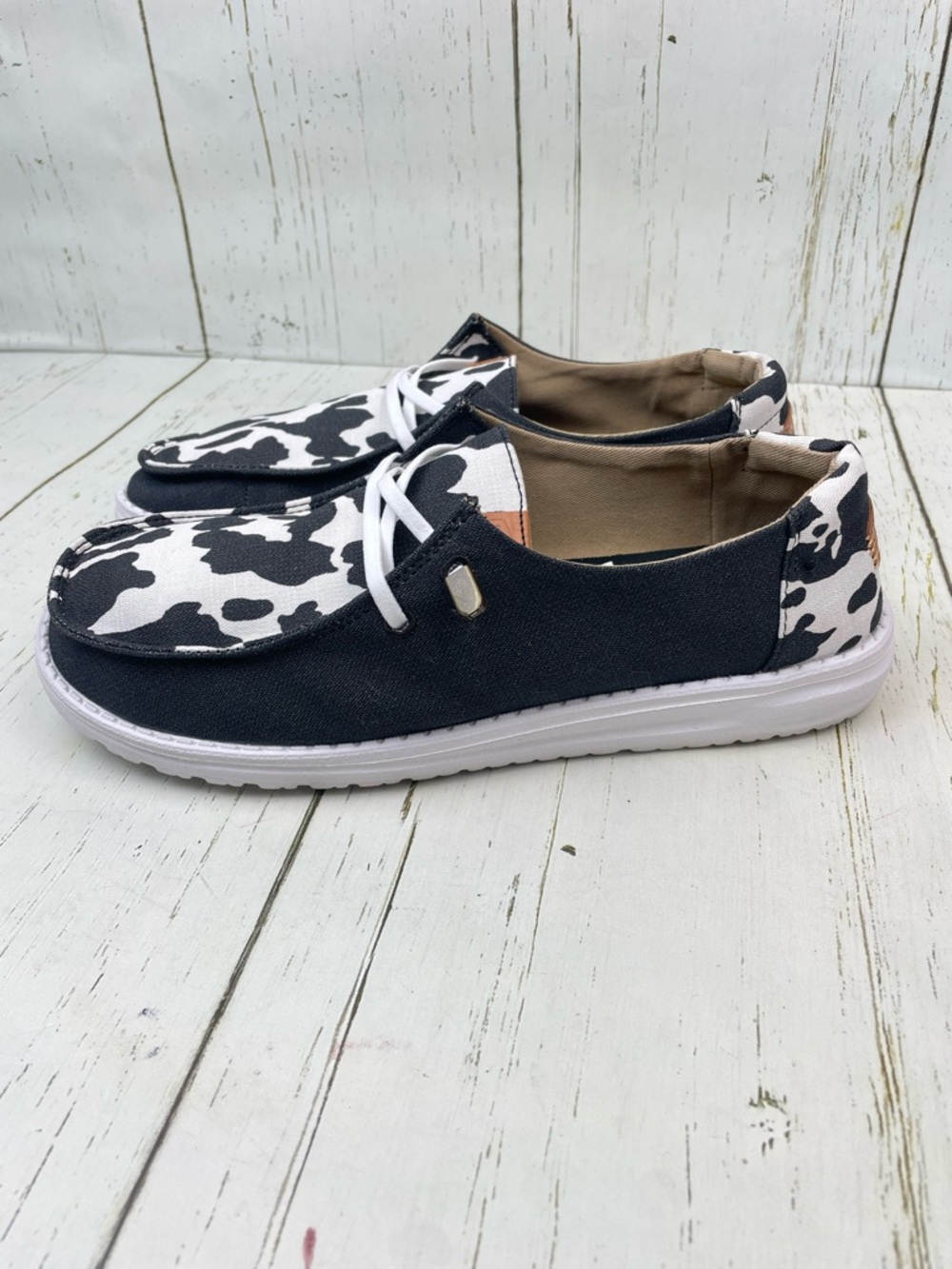 Hey Dude Women’s Wendy Animal Black Cow Print Slip-On Shoes